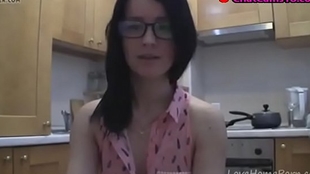 spectacular teen in sexy glasses talking in the kitchen