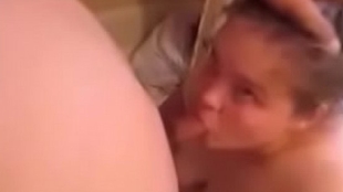 Strange MILF sucks dick and gets a huge portion of cum on her face while using the bathroom